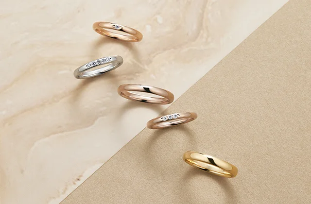 Wedding band materials in Hong Kong – from platinum to refined neutral-warm Pale Brown Gold.