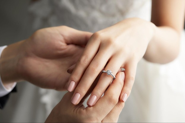 Engagement ring on left ring finger
